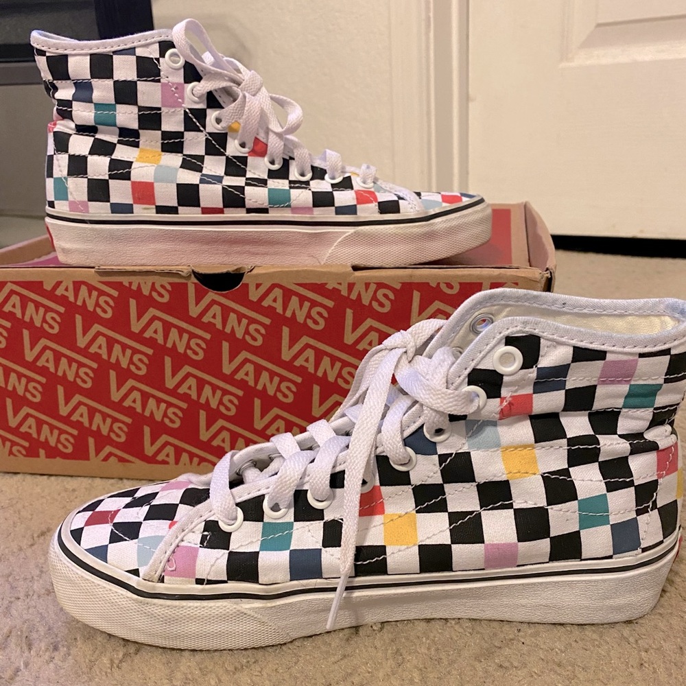 High top checkered vans.